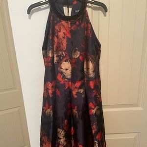Size: 8, MultiColored, Halter-Top Special occasion dress (never worn)